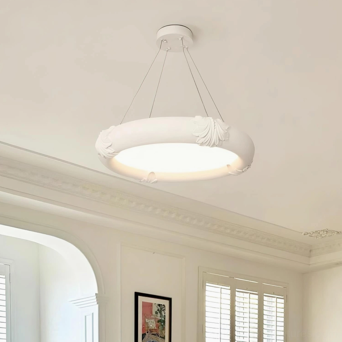 Small diameter white plaster shell relief pendant light close-up overhead view