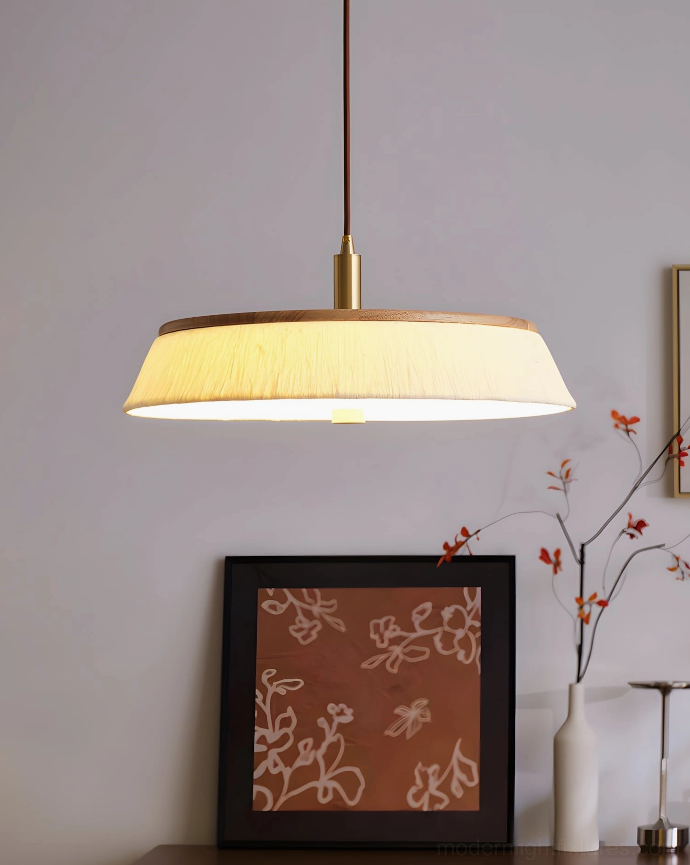 Small rice paper pendant light size in natural oak finish, low-profile design maintaining clear sightlines