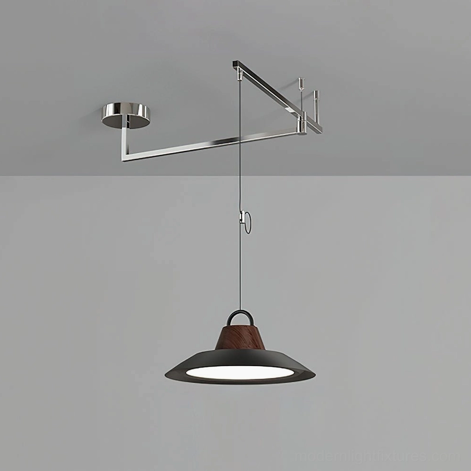 Small 30cm swing arm pendant light with black finish in compact minimalist space