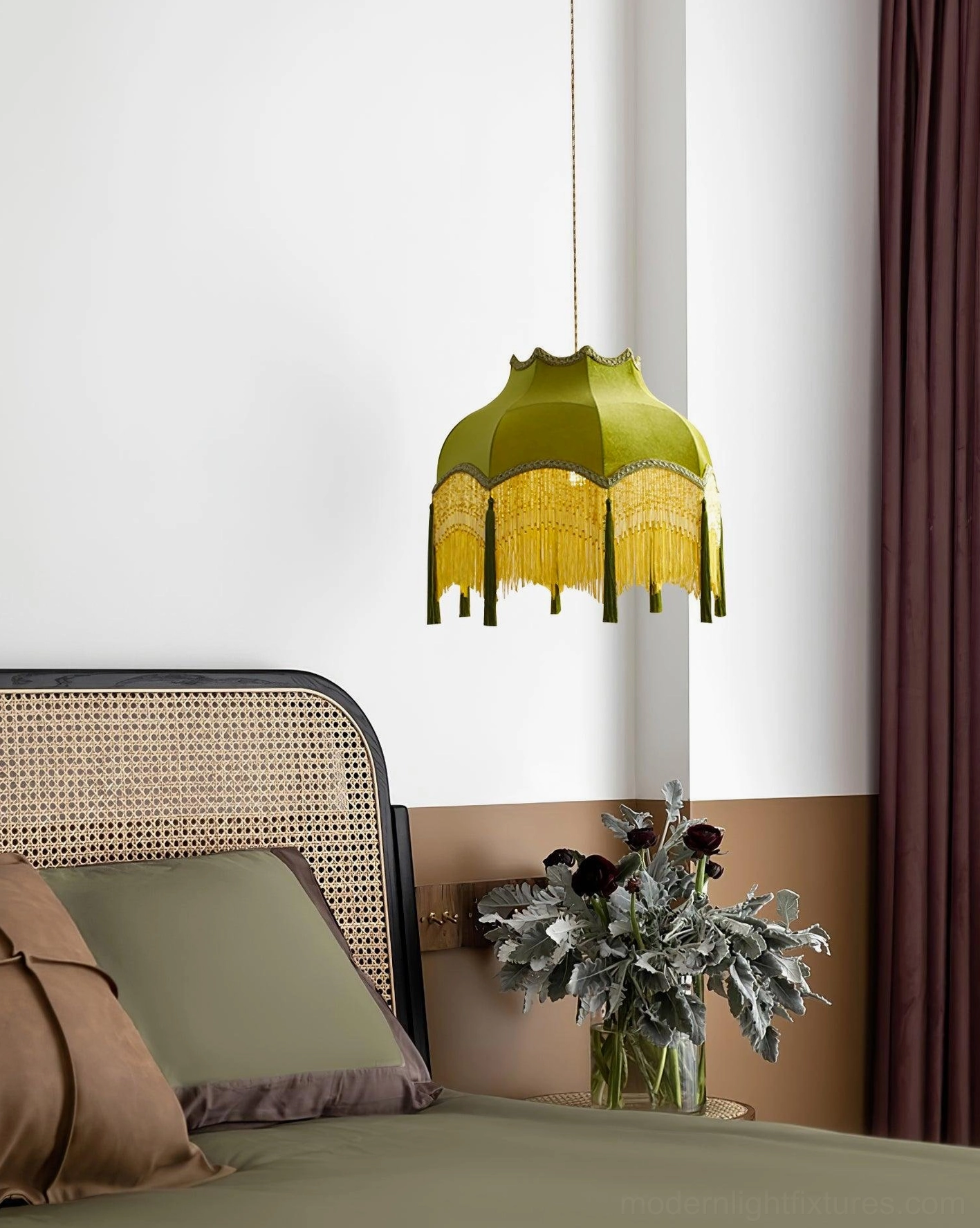 Small green tassel pendant light in modern vintage bedroom creating cozy ambiance