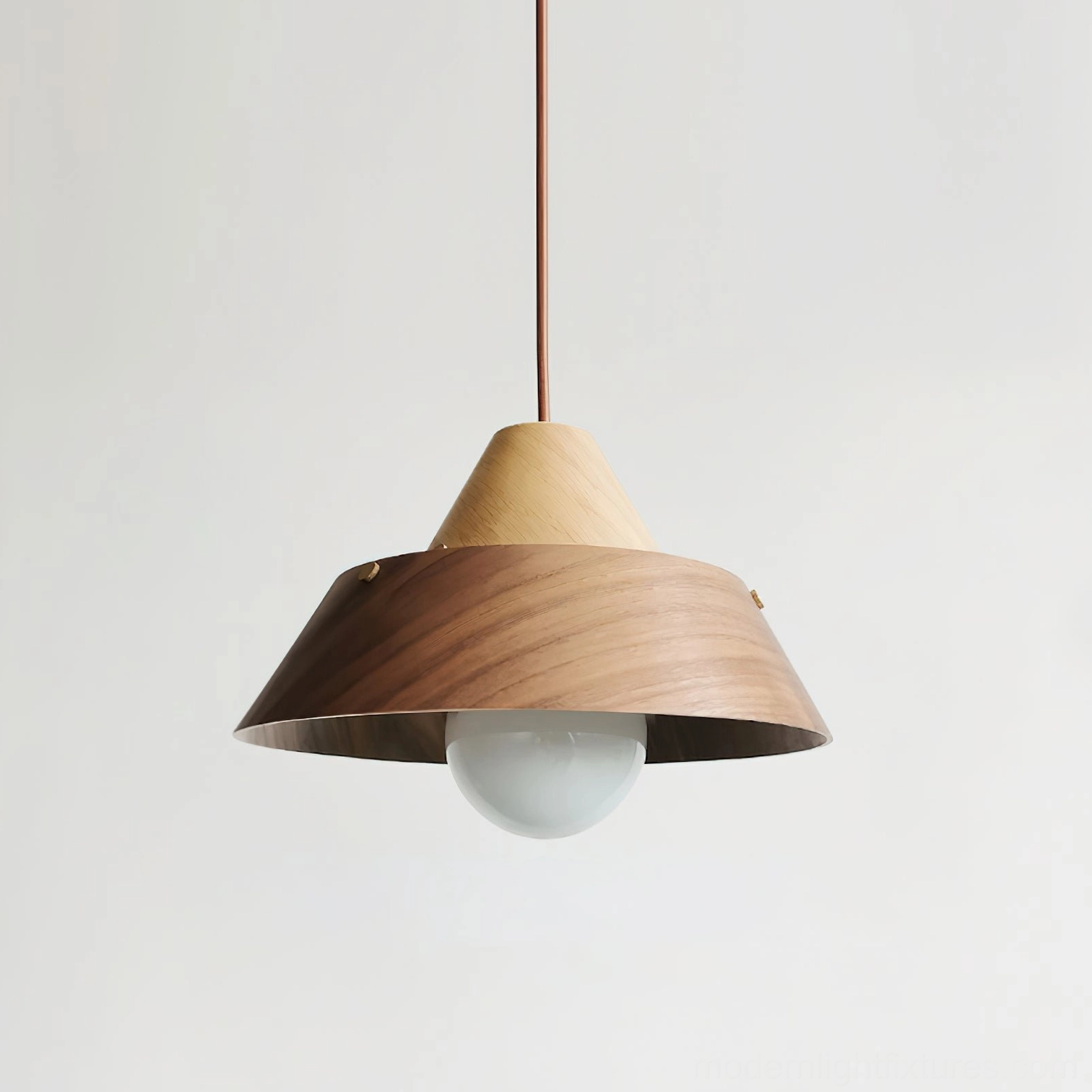 Small tiered pendant light Model I with natural wood finish in modern kitchen above counter