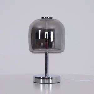 Contemporary dome table lamp with smoked glass shade and polished chrome stem - direct front view