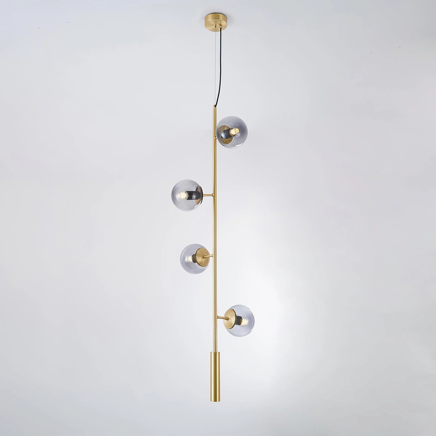 Contemporary orb chandelier with smoke gray glass and brass metal finish combination