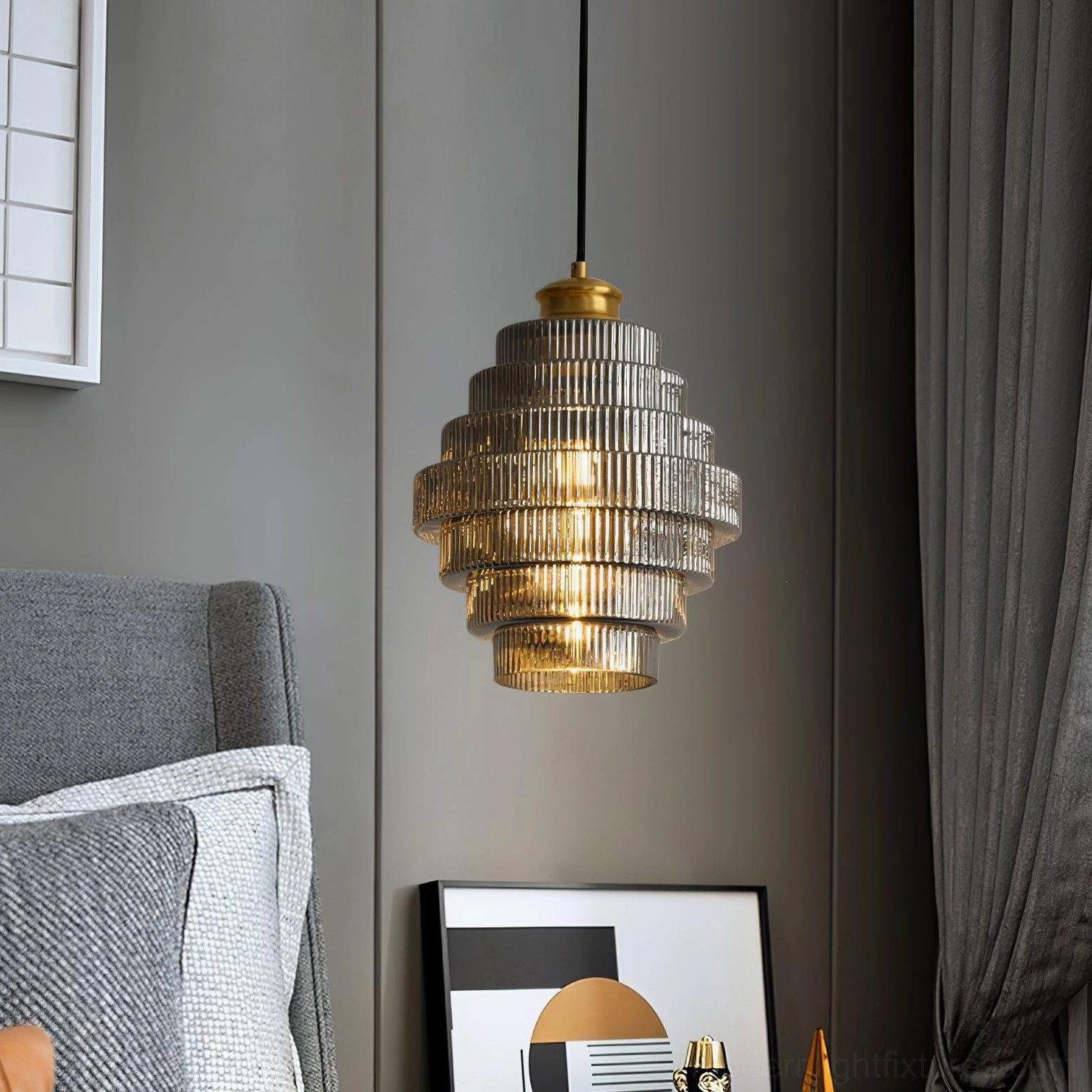 Smoke gray ridged glass pendant light in bedroom with gray sofa, modern luxury aesthetic