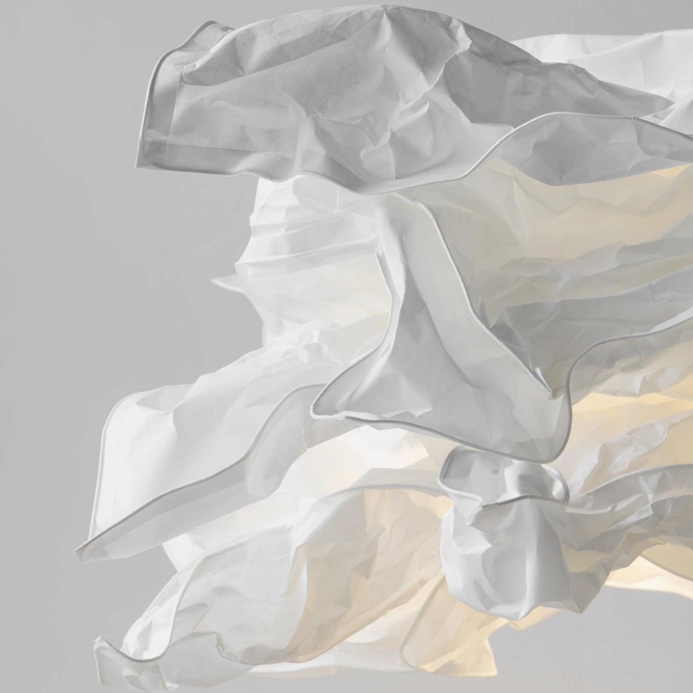 Modern sculptural paper pendant light providing soft layered illumination for relaxation spaces