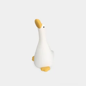 Soft silicone goose night light in warm yellow color with matte finish, front studio product view on white background showcasing cute design and premium material quality