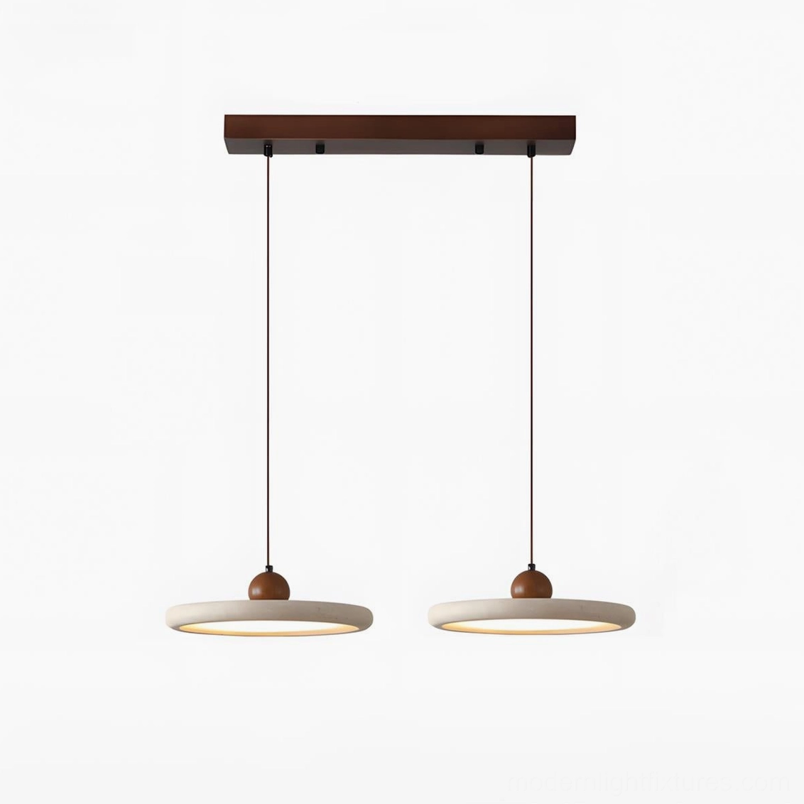 Two-head travertine pendant light set creating linear illumination above kitchen counter in contemporary dining space