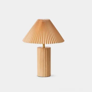 Solaire pleated fabric table lamp with natural wood base, front studio view showcasing minimalist Japanese design aesthetic