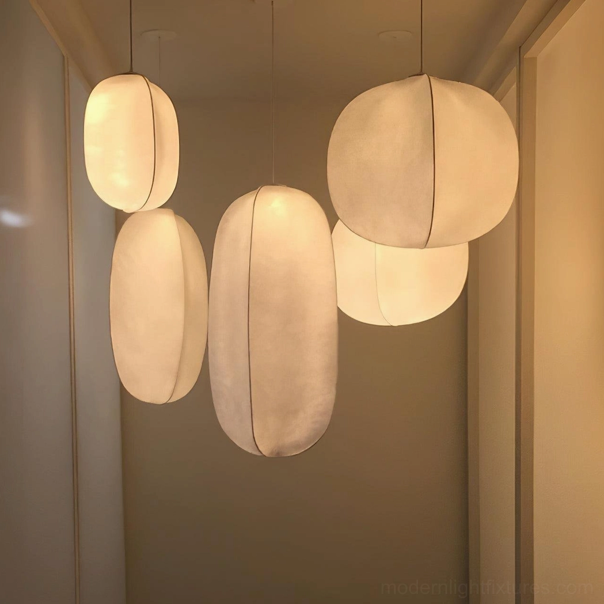Solaria fabric pendant lights cluster installation warm residential interior living room