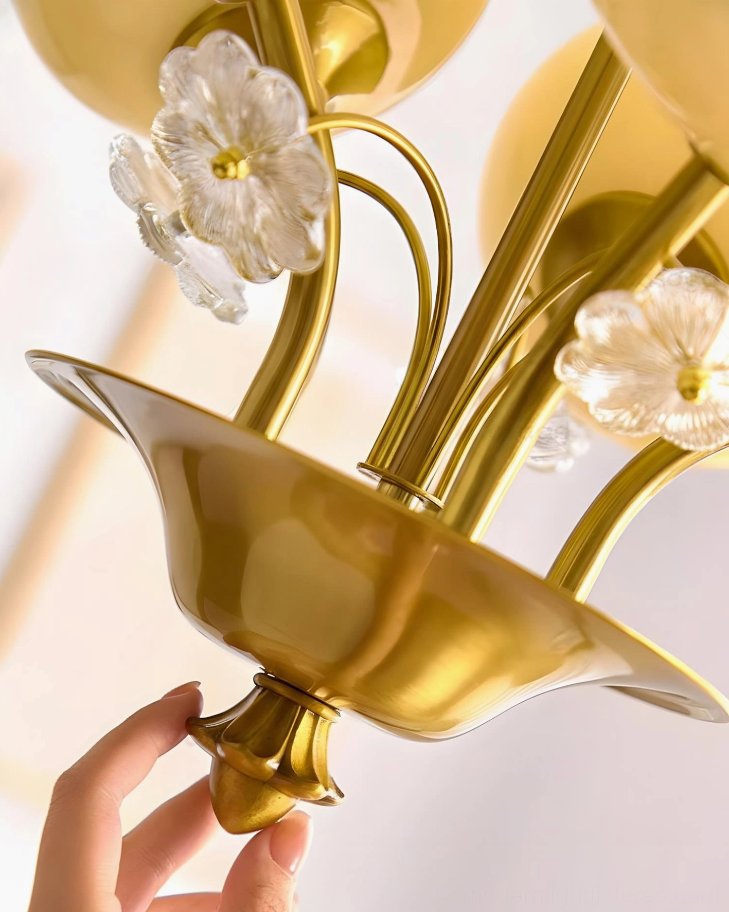 Solenne Petal Chandelier brass metal hardware and glass connector details close-up view