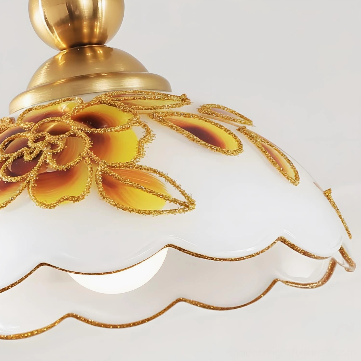 Soliloquy ceiling light fixture featuring polished metal canopy and hand-embroidered floral glass shade creating soft light