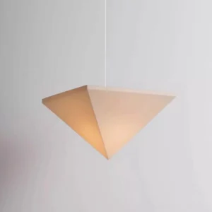 Solina Prism Pendant Light close-up detail view, warm-toned inverted triangular faceted fabric shade with minimalist matte finish