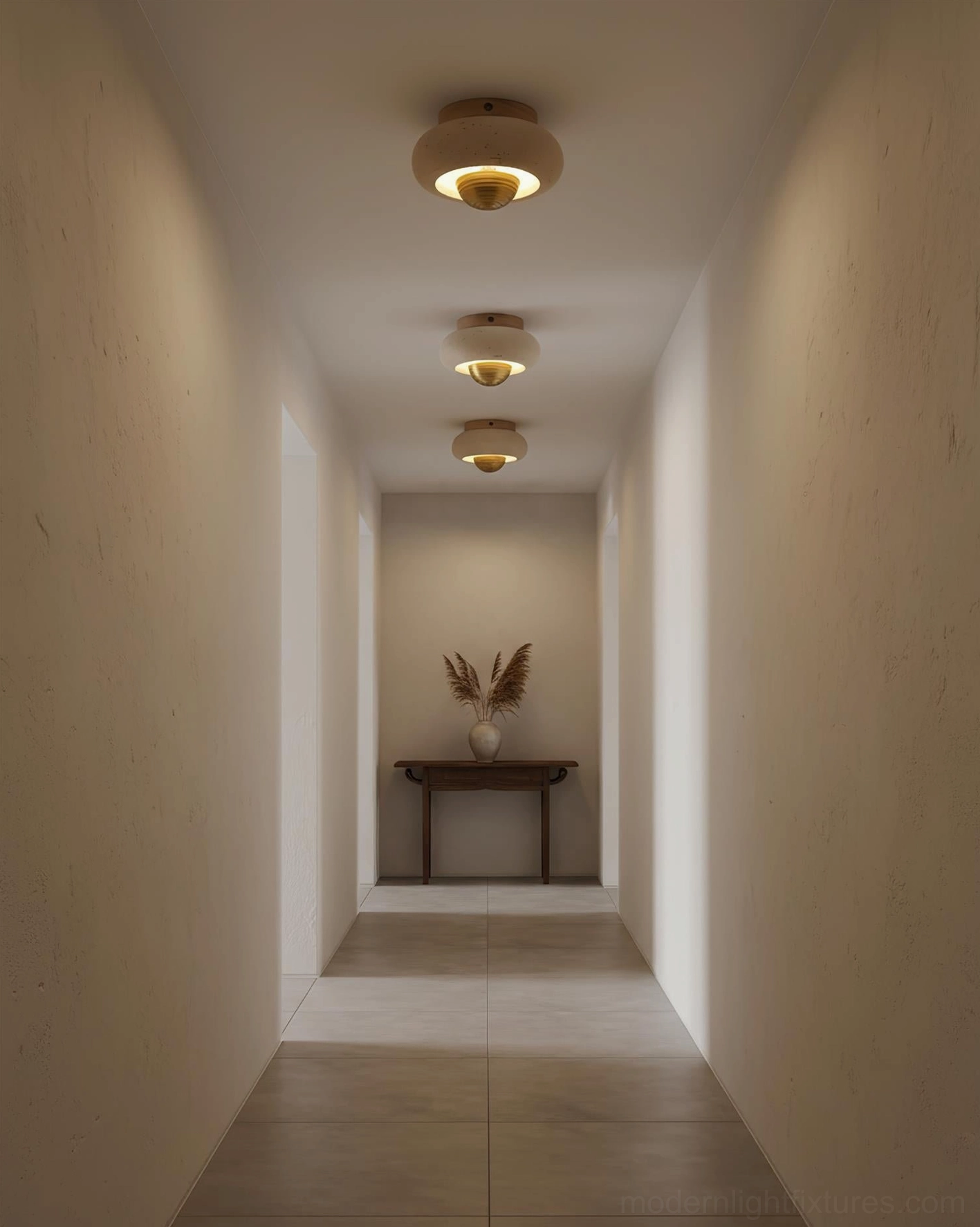 Modern travertine ceiling light fixtures installed in residential hallway with warm ambient lighting