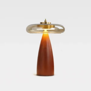 Solmira modern table lamp direct frontal studio shot showing symmetrical design with tapered walnut base and luminous smoked glass shade