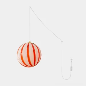 Solstice red striped hand-blown glass pendant light, front view on white studio background, showing bold red and frosted white glass sphere with gold brass fixture