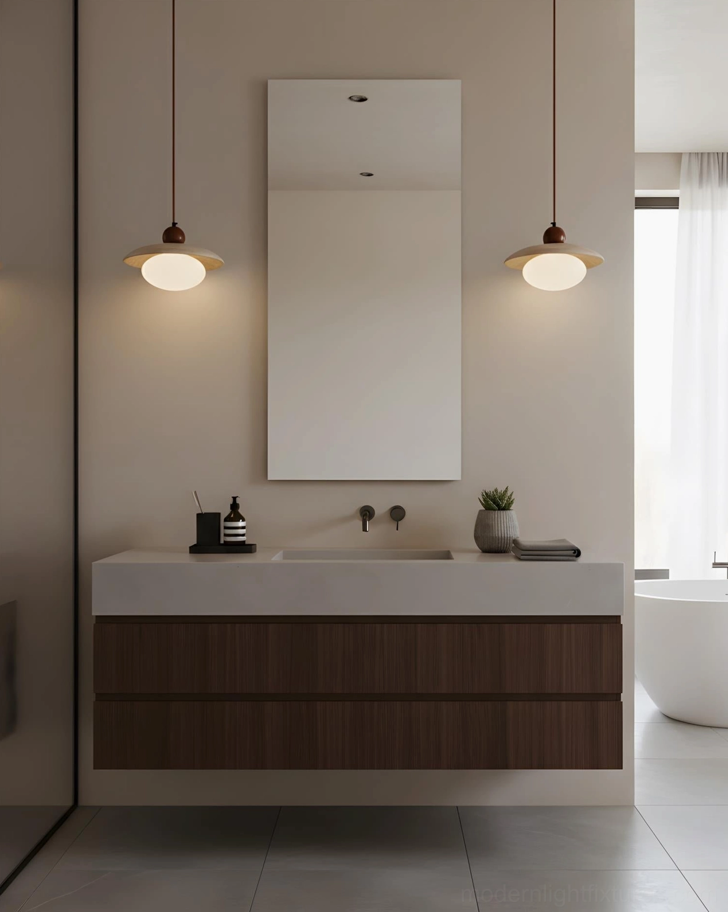 Twin Solven pendant lights above bathroom vanity mirror with contemporary design