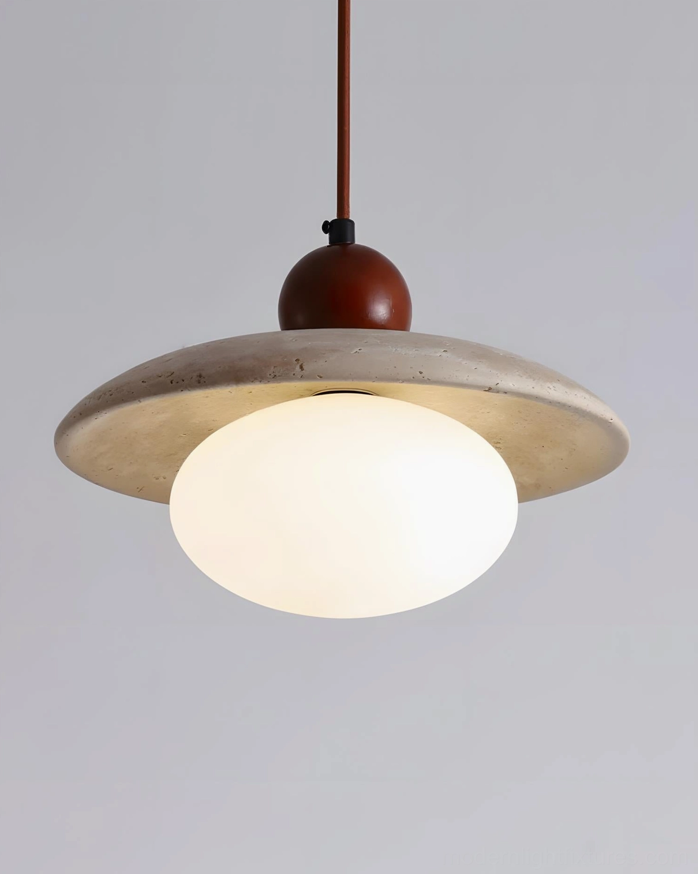 Solven modern pendant lamp with natural wood sphere and glass globe in neutral setting