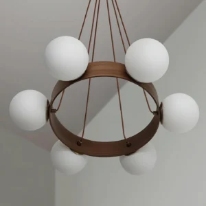 Close-up detail of Solvena chandelier showing walnut wood ring and brass suspension design