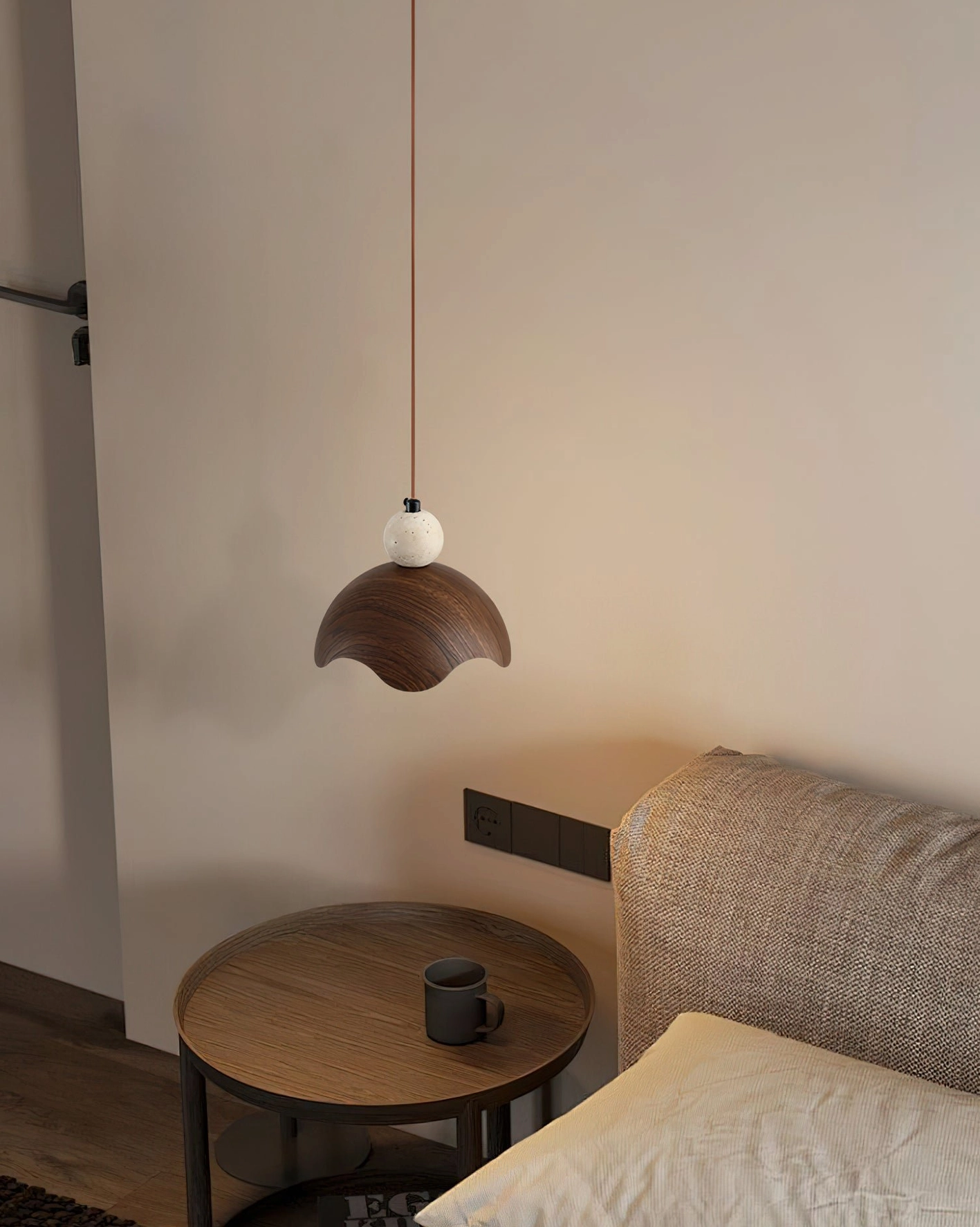 Somira minimalist pendant light installed in contemporary dining area, modern geometric design with warm illumination