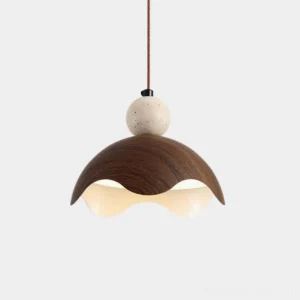 Somira modern pendant light with travertine stone detail, overhead view showing geometric metal shade and natural stone sphere accent