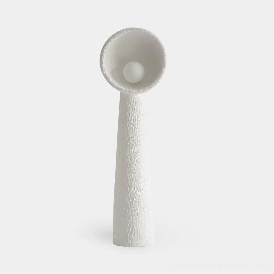 Soniah white resin floor lamp front view minimalist matte finish modern sculptural design