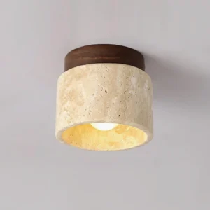Sonoma travertine stone ceiling light in walnut wood finish, overhead three-quarter angle showing textured stone surface