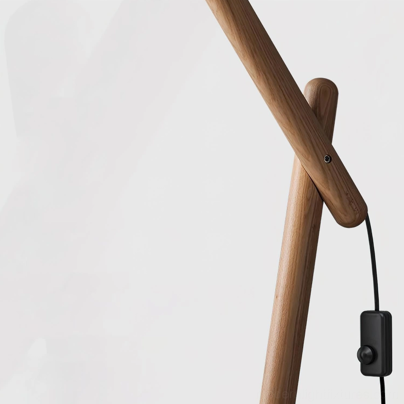 Sophisticated dark hue arc floor lamp with slender angular body and elegant fabric shade suspension