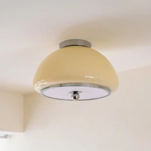 Mid-century modern ceiling light fixture with frosted glass dome in chrome and beige finish - overhead installed view