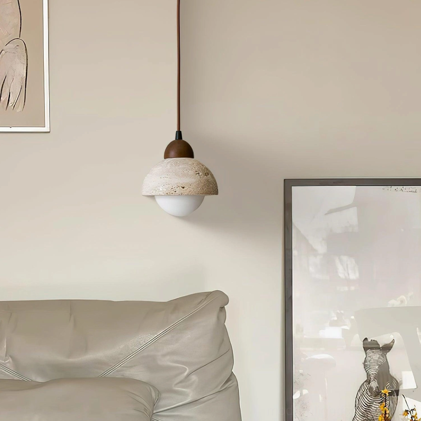 Soren beige travertine pendant light creating warm intimate ambiance in modern space