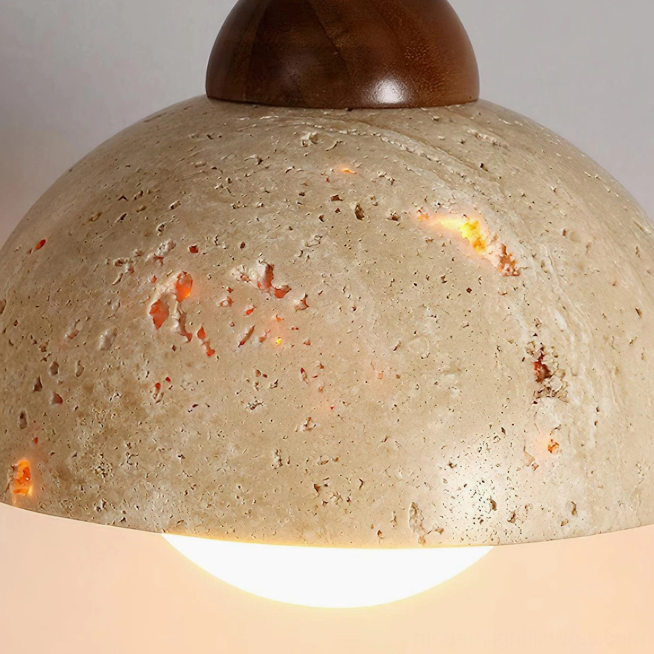 Soren travertine pendant light side profile showing dome shape and proportions design