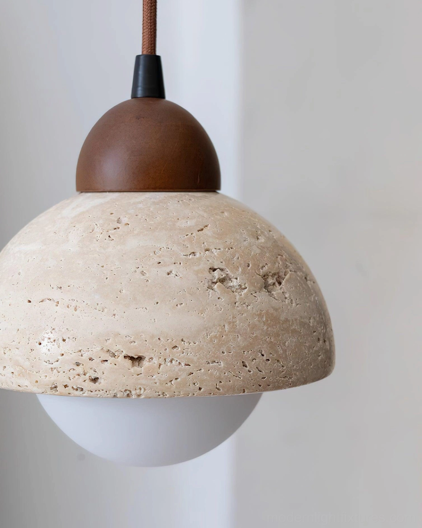 Soren travertine pendant light installed in japandi interior natural materials aesthetic
