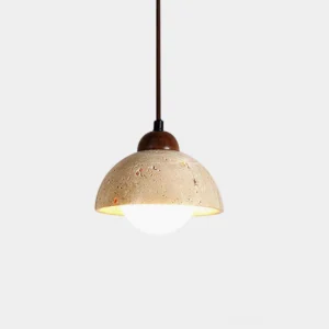 Soren travertine dome pendant light with beige stone shade and dark hardware close-up studio view