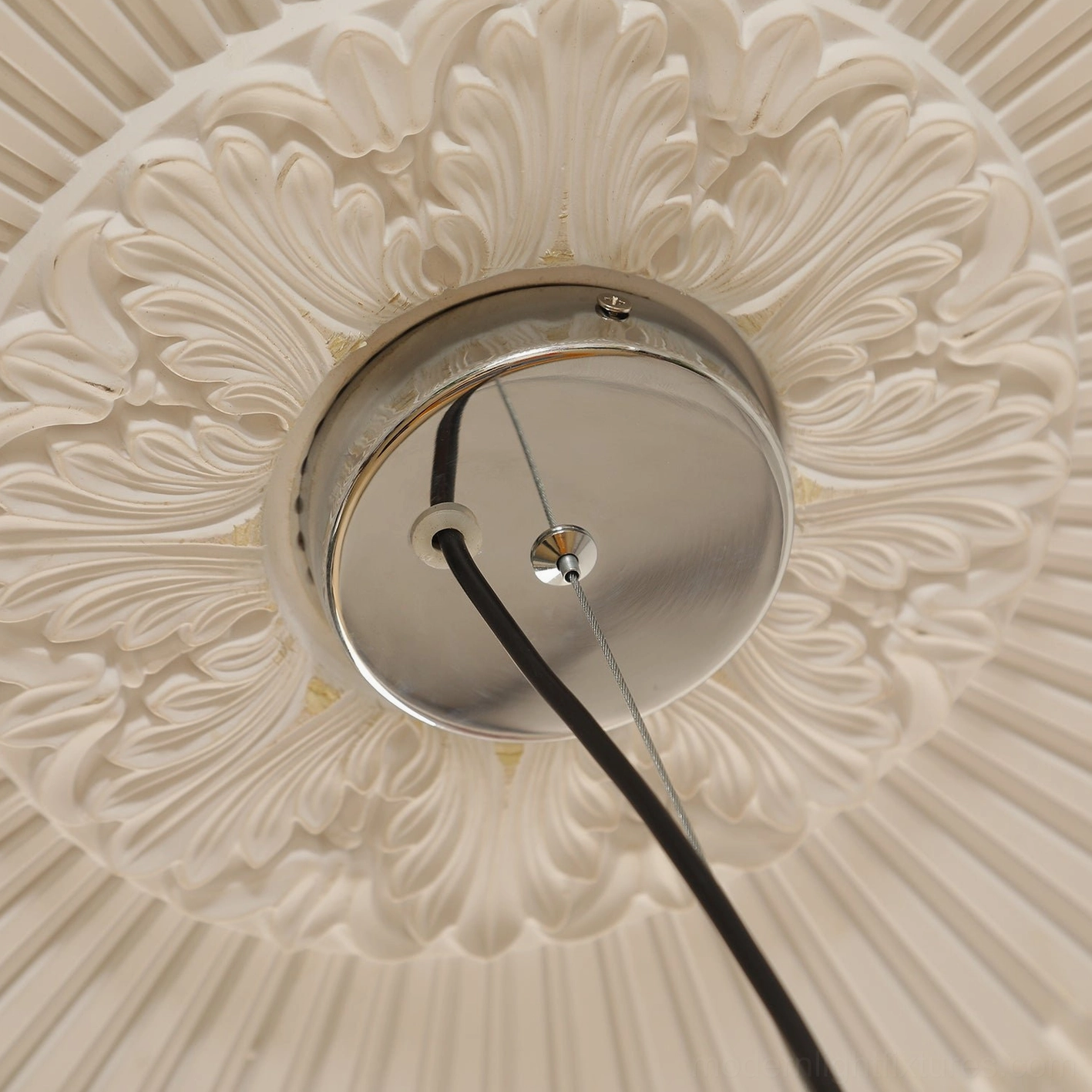 Sowden cone pendant light design composition highlighting metal guard rings and geometric proportions