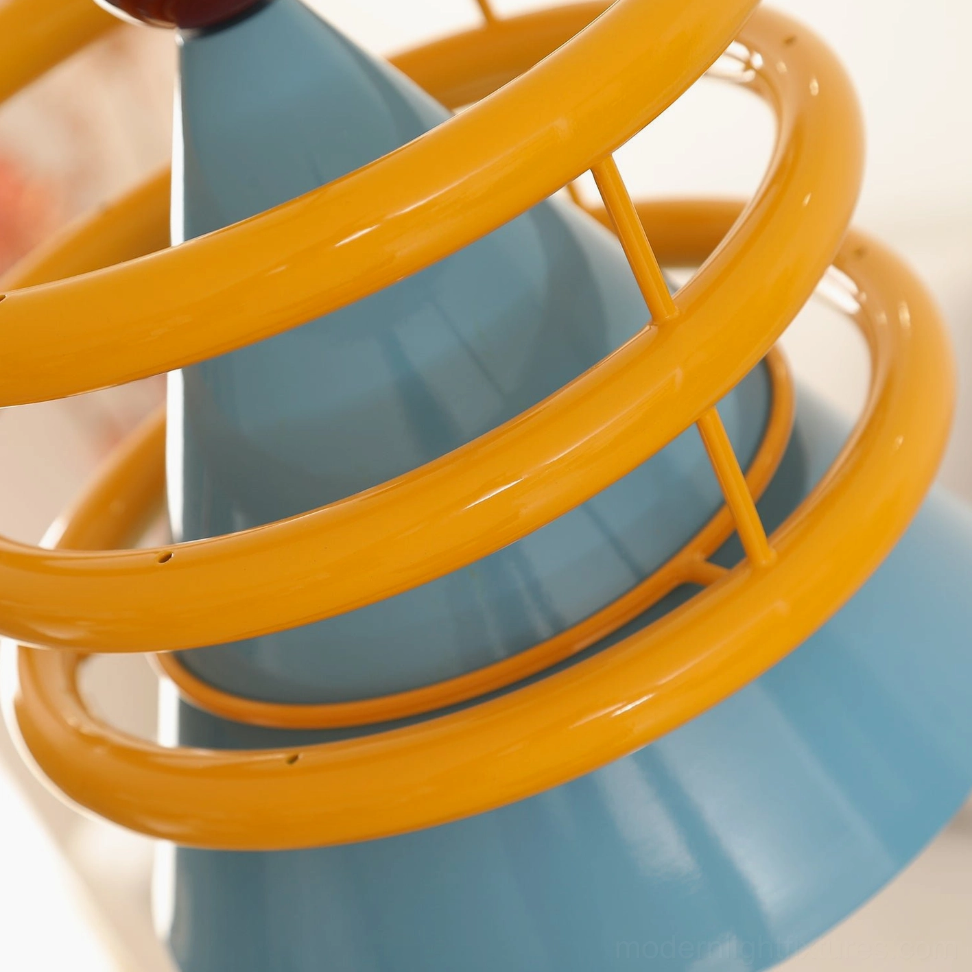 Sowden geometric cone pendant lamp studio detail shot, showcasing color-block metal construction and artistic design