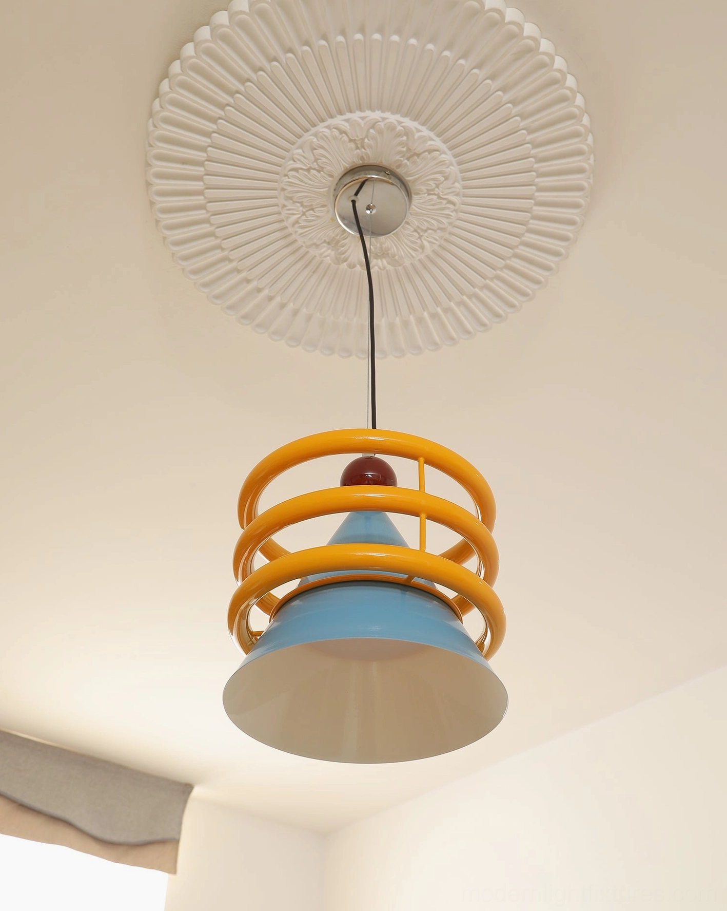 Sowden geometric cone pendant light mounted installation showing hardwired setup and ceiling rose compatibility
