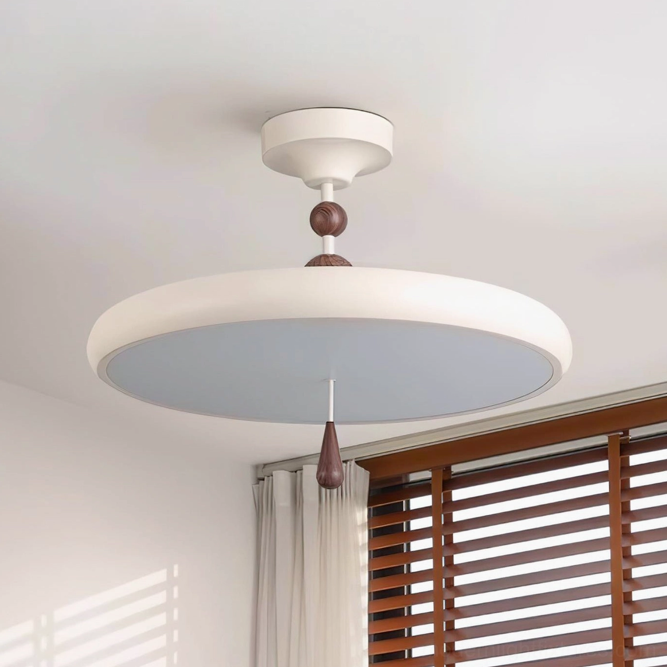 Two-tone modern Spectrum Ring ceiling light with side view showing walnut and white finish combination
