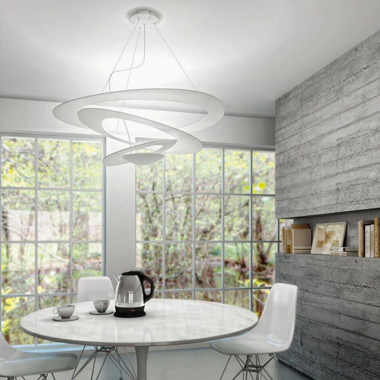 Spiral LED ring pendant over dining table, warm ambient lighting for gatherings and meals