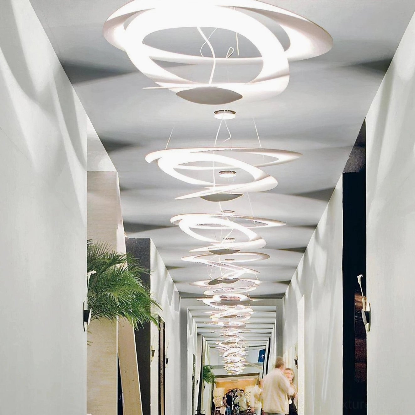 Modern spiral ring chandelier close-up, metal construction detail and LED array configuration
