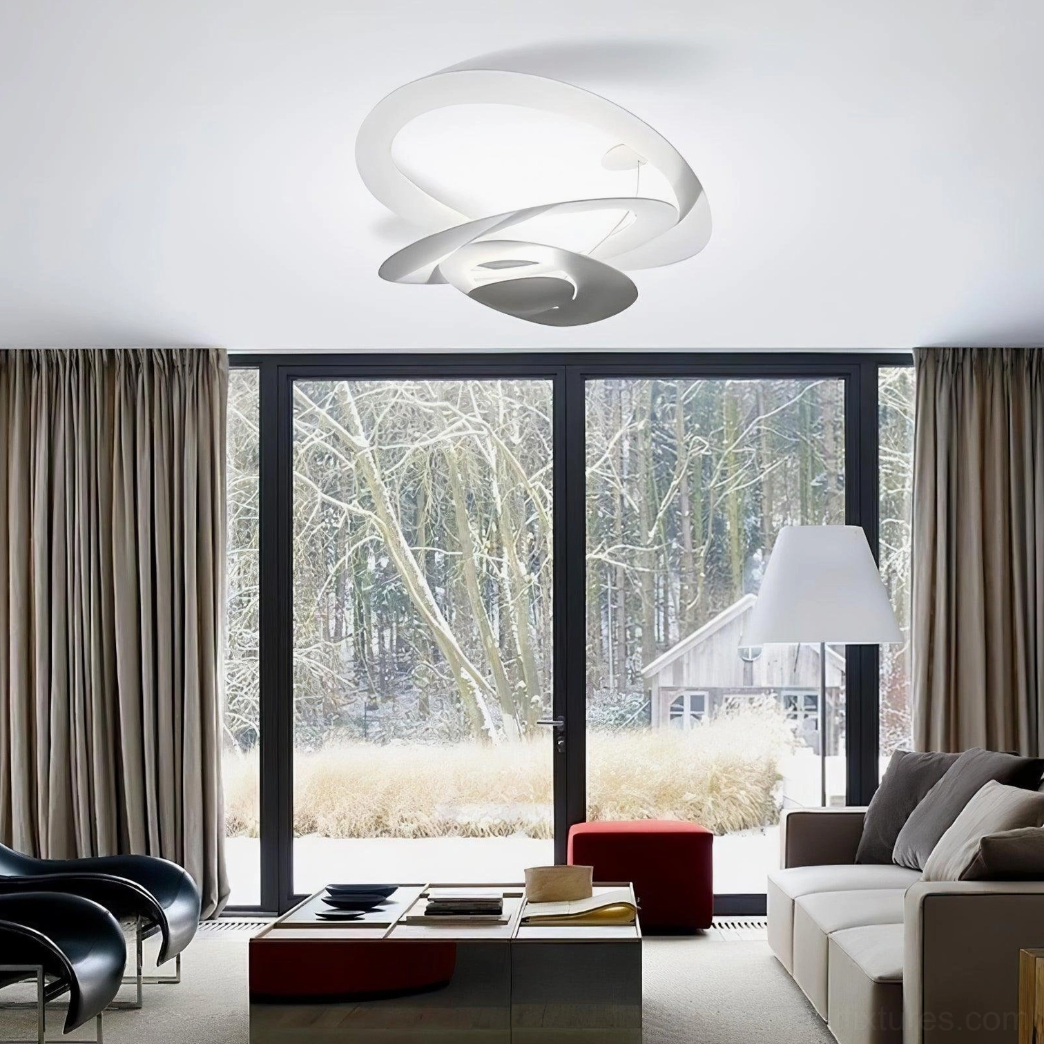 Spiral ring LED chandelier in open-plan kitchen and dining area, unified design aesthetic