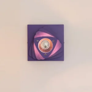 Spirora wall sconce overhead product shot featuring purple lavender powder-coat finish with spiraled petal geometry