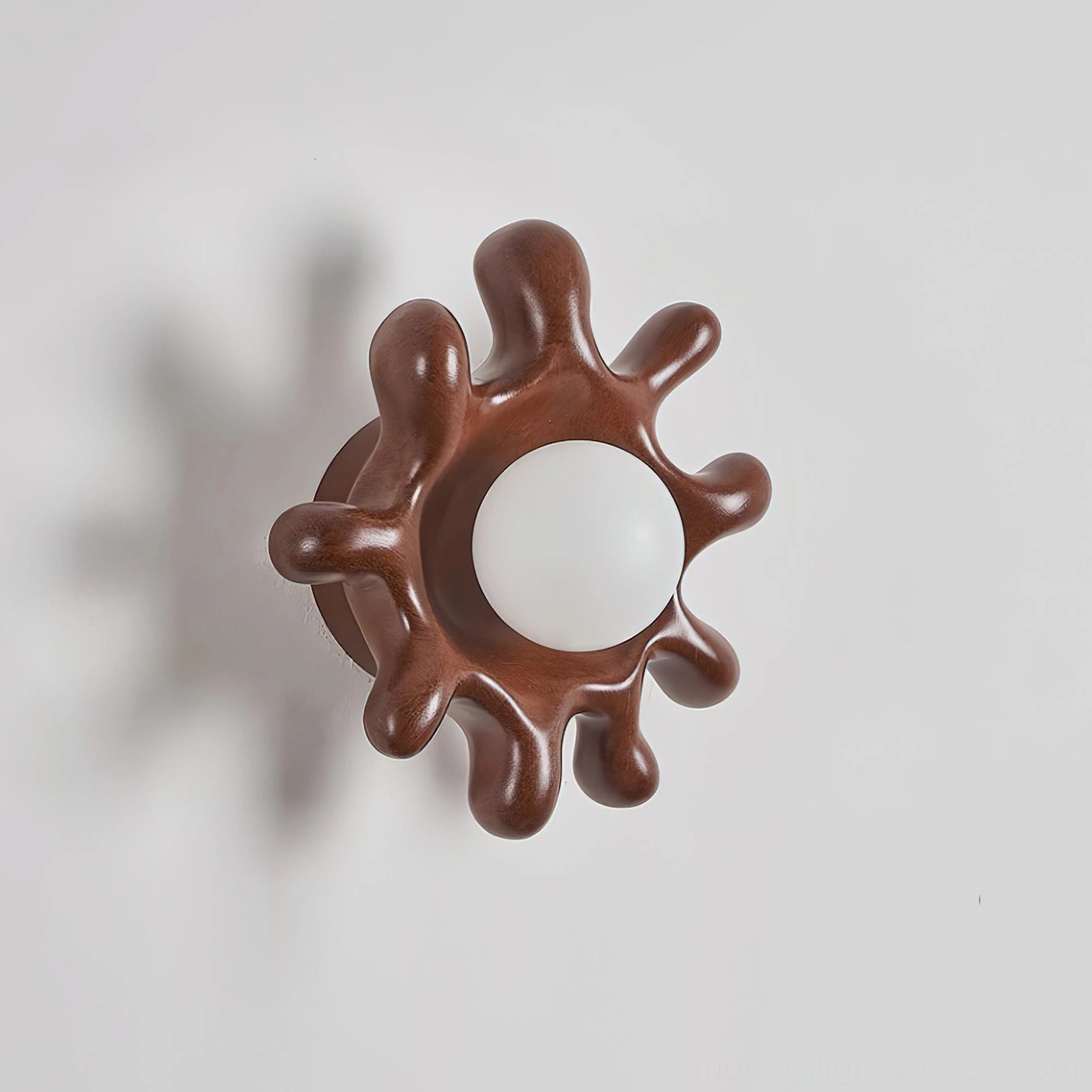 Splova brown mud finish wall sconce artistic lighting installation