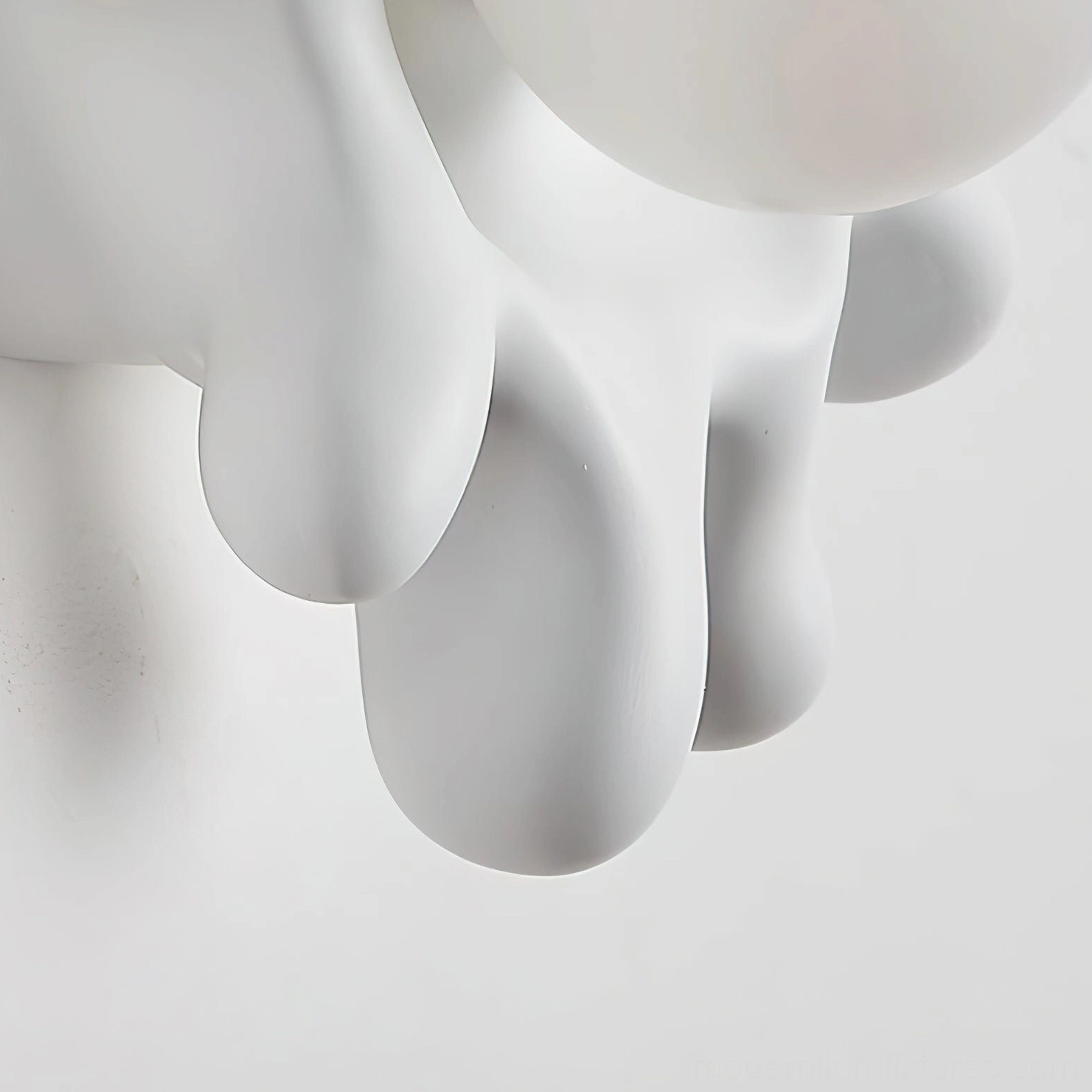 Splova wall sconce gallery display of sculptural modern lighting design