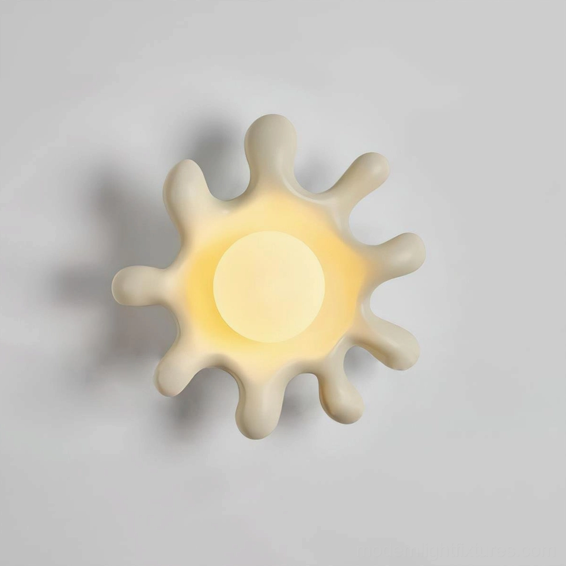 Splova wall sconce illuminated warm ambient glow in contemporary space