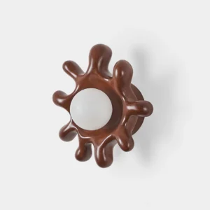 Splova organic wall sconce front view with irregular sun-shaped design in dark brown finish