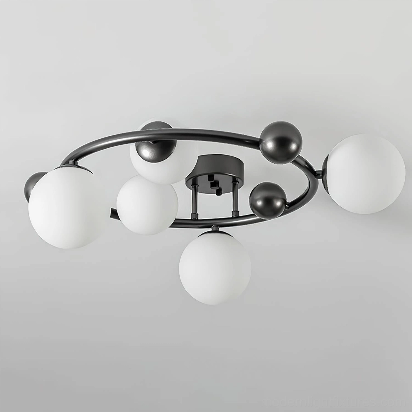 Modern sputnik ceiling light fixture in black finish - side angle view showing sculptural metal frame and glass globes