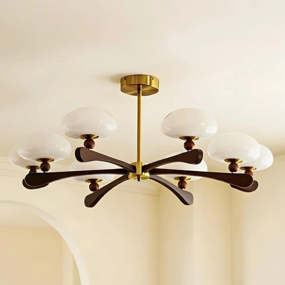 8-light sputnik-inspired chandelier with curved dark walnut ash wood arms, brass gold fixtures, and frosted milky opal glass shades—ceiling installation view