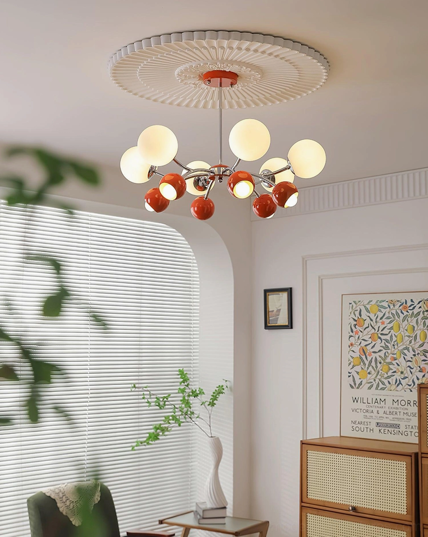 Sputnik pendant light fixture detail view of polished chrome frame and frosted glass shade finish