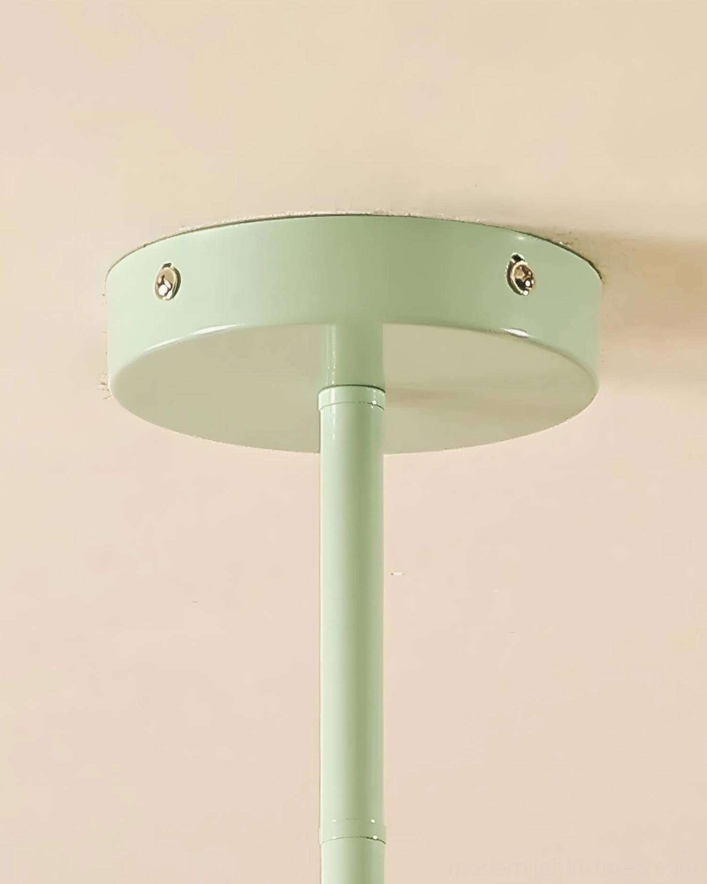 Sputnik starburst chandelier detail view, pastel green metal construction, pink yellow lamp shade composition, mid-century atomic design aesthetic