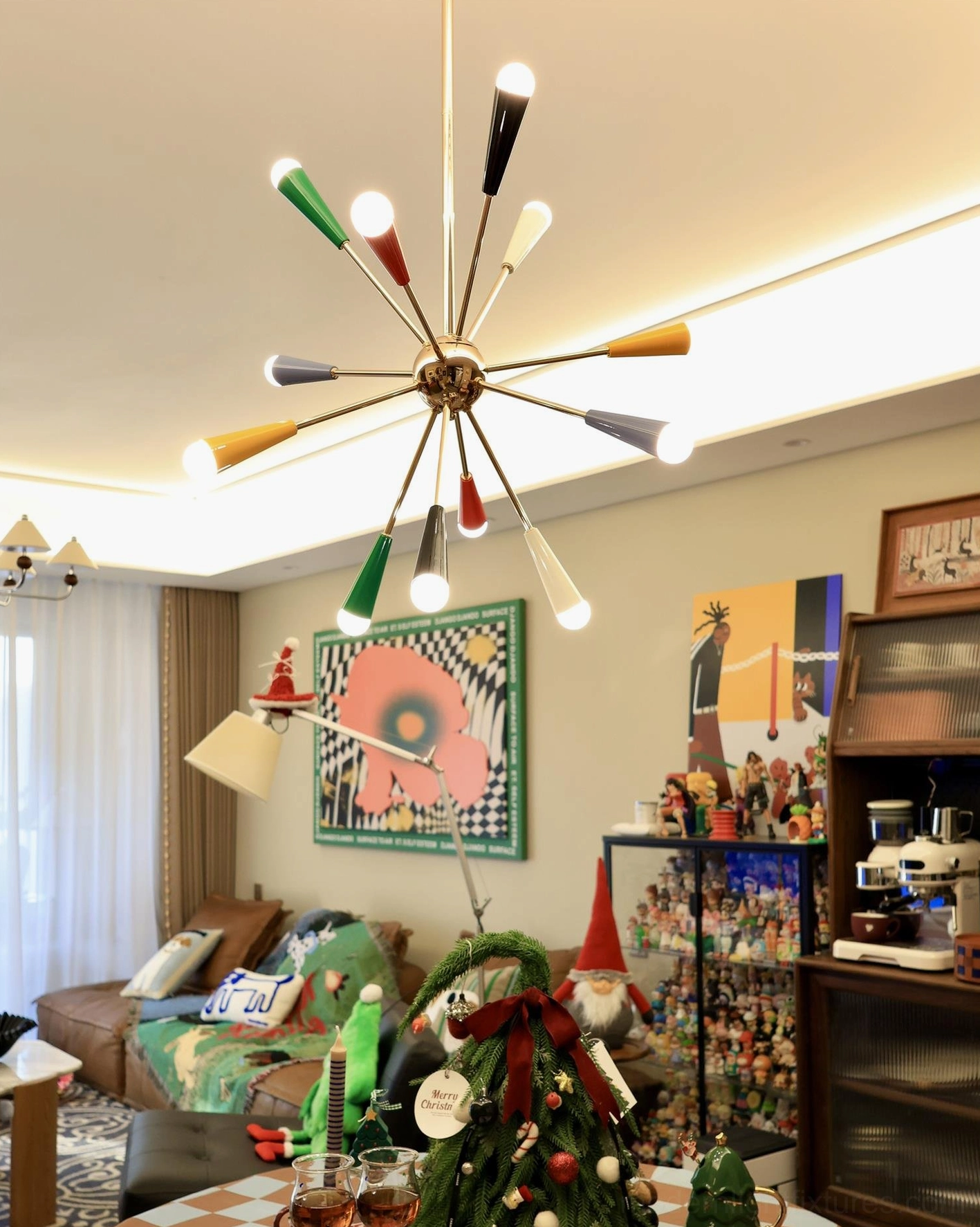 Sputnik starburst pendant light installed in contemporary dining room with minimalist decor