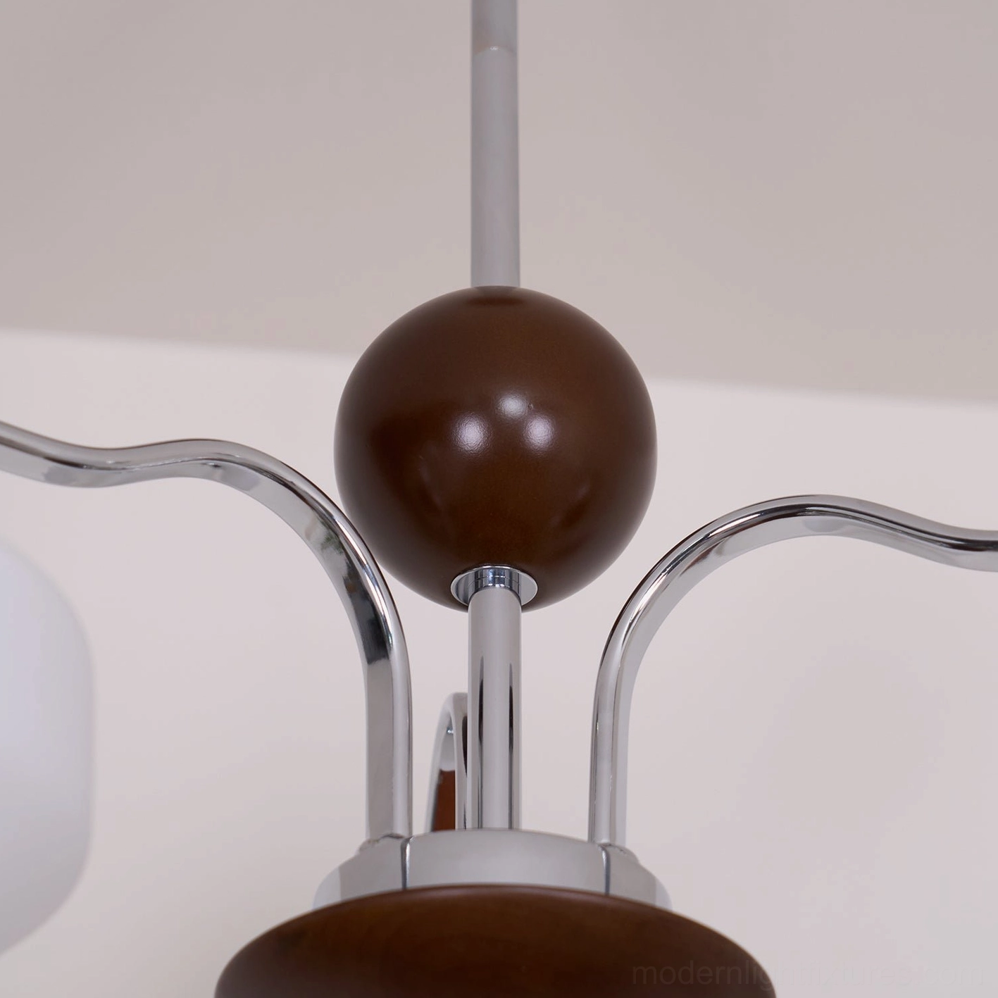 Full retro sputnik chandelier display with all heads illuminated showing warm light diffusion